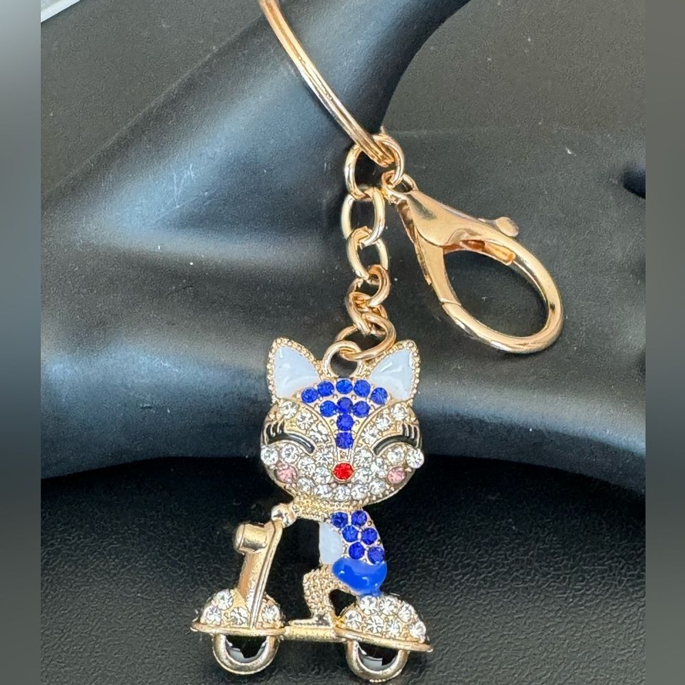 BAG CHARM  Gold Tone Blue Crystal Kitty on Scooter Bag Charm Keychai